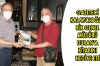 GAZETECİ KALAYCIOĞLU, BİK GENEL MÜDÜRÜ DURAN’A KİTABINI HEDİYE ETTİ