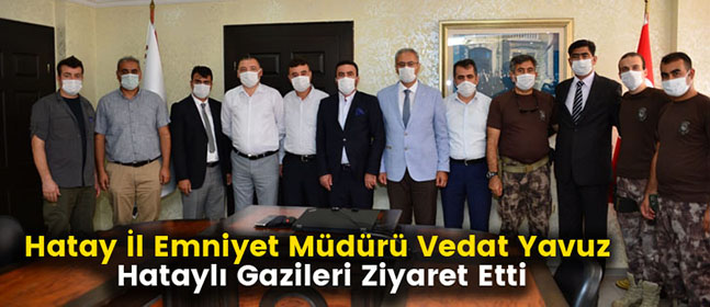 uz-hatayli-gazileri-ziyaret-etti-174401-a4a46a