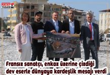 Fransız sanatçı, enkaz üzerine çizdiği dev eserle dünyaya kardeşlik mesajı verdi